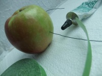 Wire apples and seal the insertion point