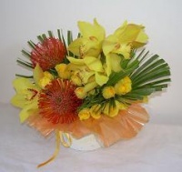 Cymbidium Friendship Arrangement in a Papier Mache Container