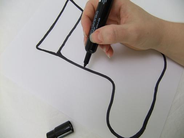 Draw the Christmas stocking shape on paper