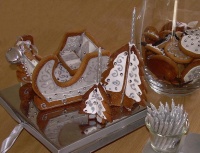 Silver bell and Gingerbread sleigh with frosted trees 