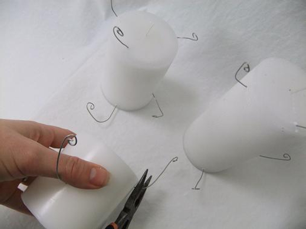Continue adding wires to create a spiral up the candle