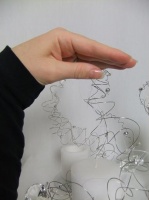 Measure the height of a table design from elbow to duck beak.