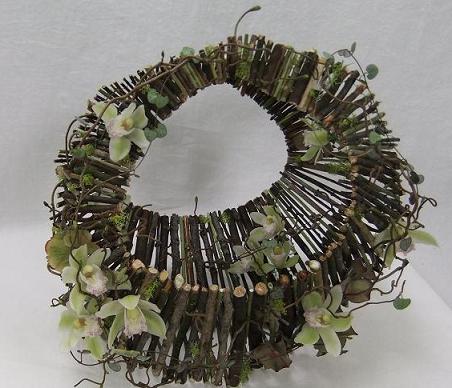 Moss covered twig handbag floral art design Moss covered twig handbag floral art design