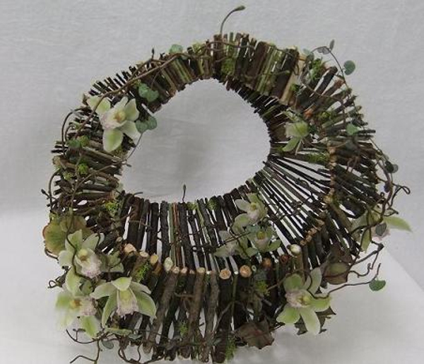 Moss covered twig handbag floral art design