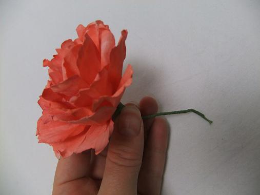 Wire the paper carnation and tape it with florist tape
