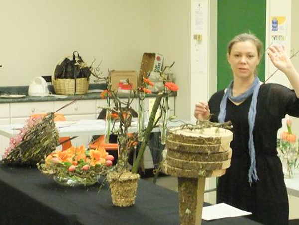 The demonstration explores ways to express yourself with floral art