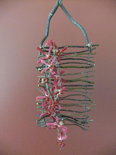 Willow twig blind with tiny Mokara orchids Willow twig blind with tiny Mokara orchids