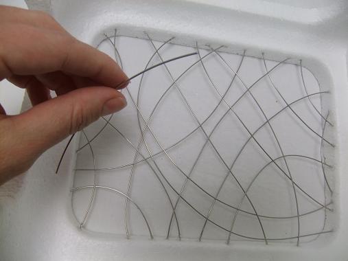 Add wires to make a firm grid.