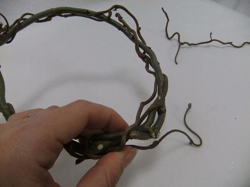 Build up the net by weaving in Hazel twigs.