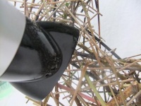 Blow away hot glue strands