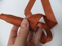 Wrap a gift test tube with ribbon