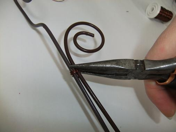Cut the wire short and fold any sharp ends in