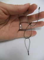 Single strand pine needle chain-link garland
