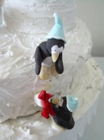 Snow cake and the five present wrapping penguins