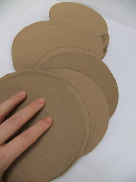 Cut a stack of cardboard circles.