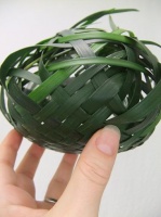 Grass shelter for a glass bubble vase