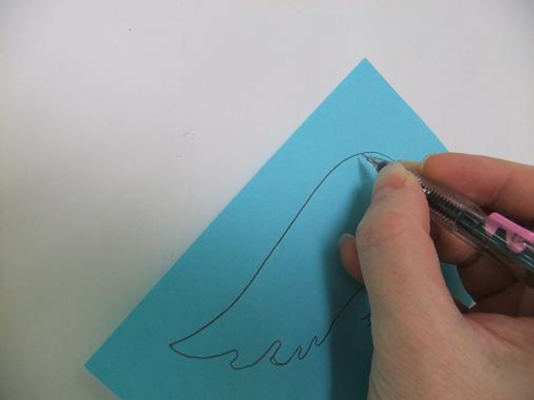 Draw the wing shape on paper and cut it out