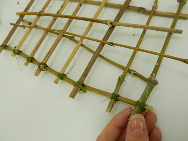 Move down the length of bamboo and latch each piece together