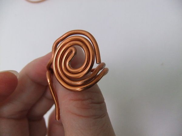 And wrap the wire ends around the spiral
