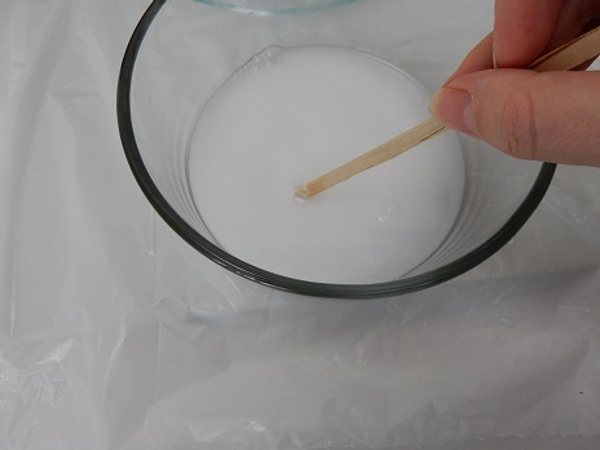 Thin the glue with warm water