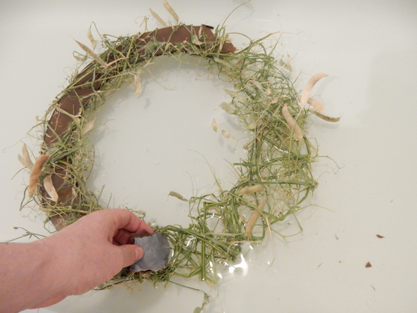 Move around the wreath and rip out the soggy cardboard