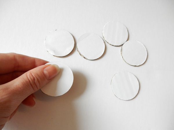 Cut disk shapes from cardboard