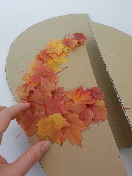 Cover the surfaces with autumn leaves following the shapes