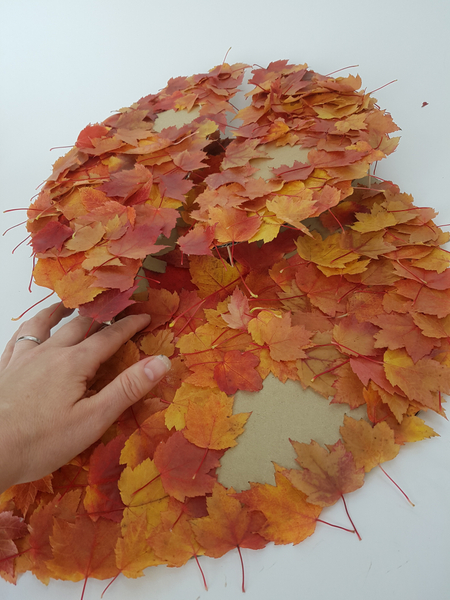 If it is difficult to glue the leaves on the bottom section simply lift it off