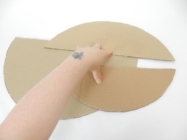 Place the cardboard circles on a flat work surface