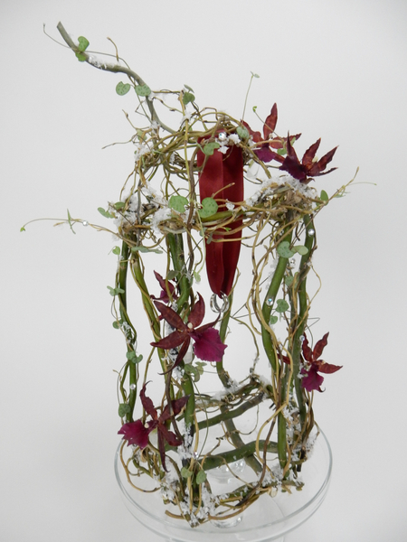 Willow and orchid flower arrangement