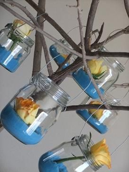 Hanging ball jars on a branch Hanging ball jars on a branch
