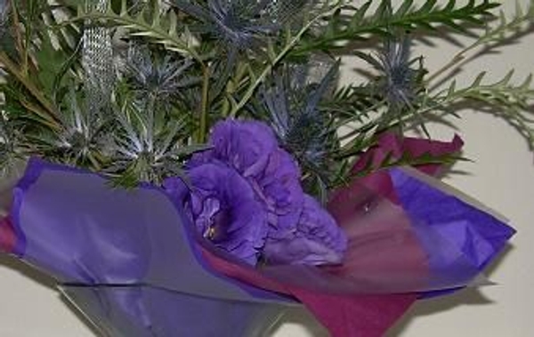 Lining a container with tissue paper and cellophane Lining a container with tissue paper and cellophane