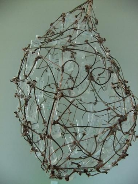 Glue test tubes into the cherry twig cocoon frame Glue test tubes into the cherry twig cocoon frame