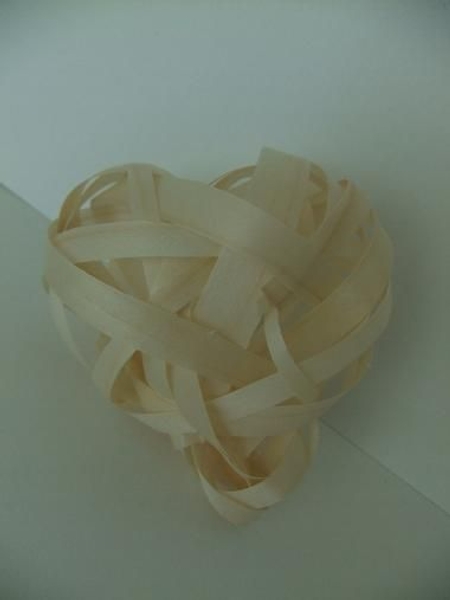 I wove the heart shape form shaved wood strips I wove the heart shape form shaved wood strips