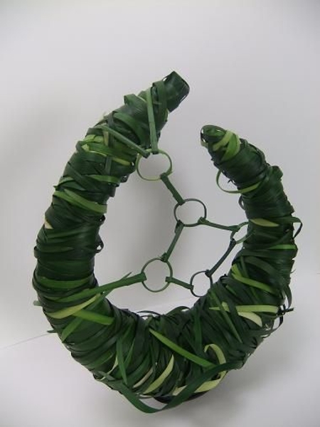 Looped lily grass contemporary floral art design Looped lily grass contemporary floral art design