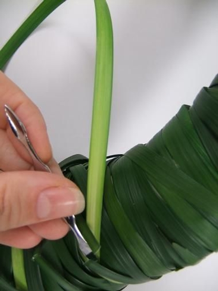 Tuck in the lily grass ends Tuck in the lily grass ends