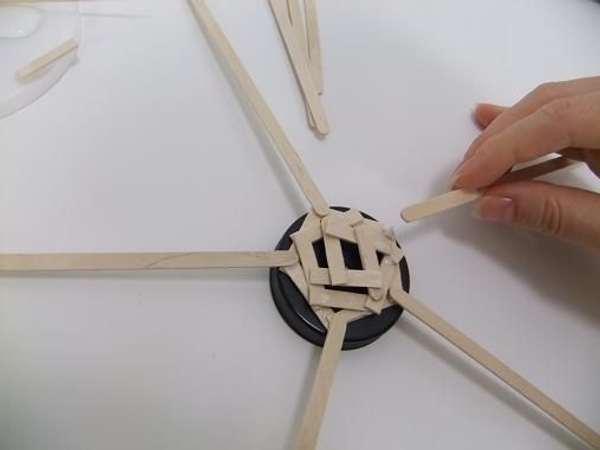 Glue on 5 wooden peg supports for the floral parasol Glue on 5 wooden peg supports for the floral parasol