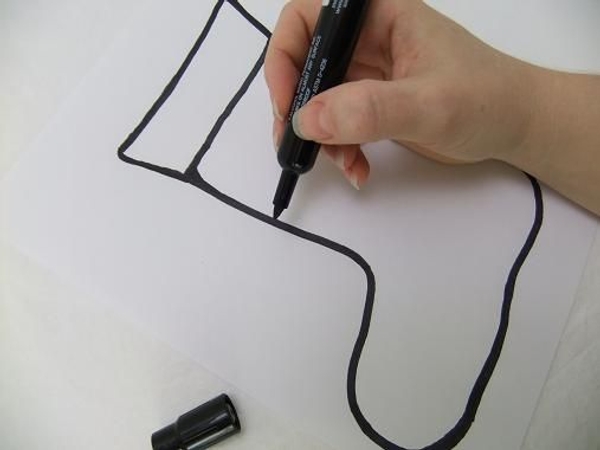 Draw the Christmas stocking shape on paper Draw the Christmas stocking shape on paper