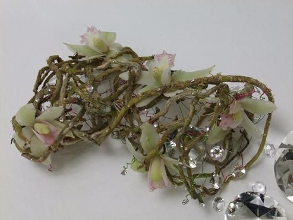 Floral arrangement using orchid roots to make Jack Frosts Christmas stocking Floral arrangement using orchid roots to make Jack Frosts Christmas stocking