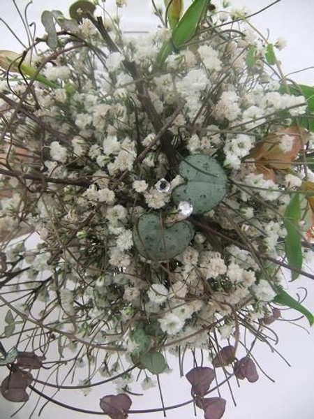 Forest floor snowball hand tied arrangement