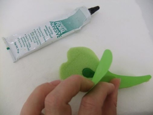 Glue the paper to the foam over the magnet Glue the paper to the foam over the magnet