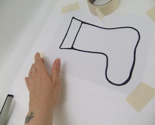 Tape the drawing of the stocking on to a sheet of Polystyrene Tape the drawing of the stocking on to a sheet of Polystyrene