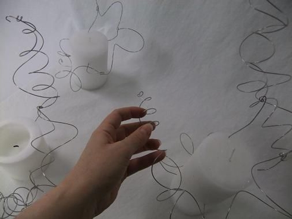 Add a second wire spiral to create a network for the flowers to rest in Add a second wire spiral to create a network for the flowers to rest in