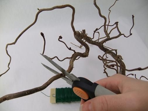 Cut the hazel twigs in short sections for the forest filigree twig wreath Cut the hazel twigs in short sections for the forest filigree twig wreath