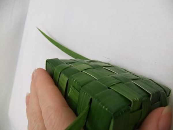 Gently hold the box and tug all the end pieces to firm up the shape Gently hold the box and tug all the end pieces to firm up the shape