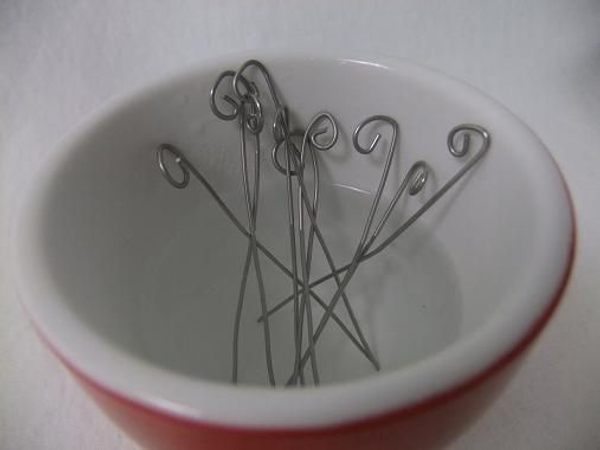 Let the wire sit in the boiling water for a few minutes to heat Let the wire sit in the boiling water for a few minutes to heat
