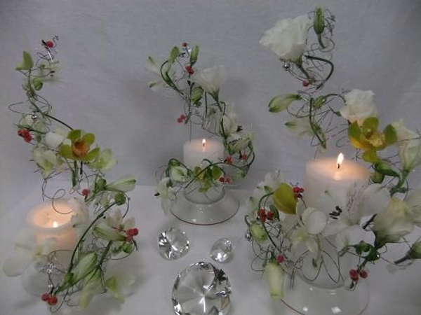 Rocking around three candle trees floral art design Rocking around three candle trees floral art design