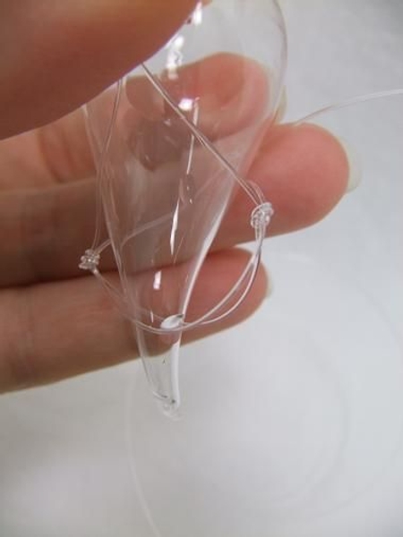 Slip the glass seahorse into the line Slip the glass seahorse into the line