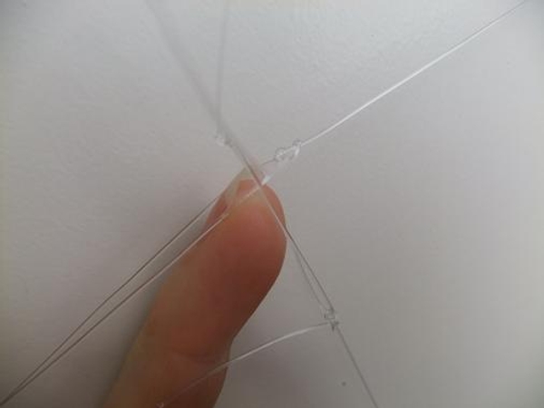 Wrap the second line around the door and tie Wrap the second line around the door and tie
