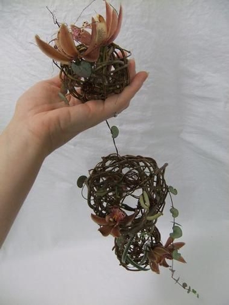 A romantic floral art arrangement that can also be used as a bridal design A romantic floral art arrangement that can also be used as a bridal design
